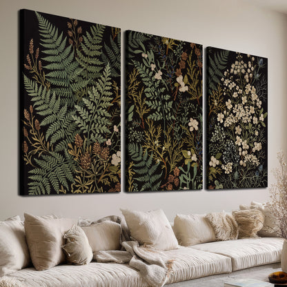 Layered green ferns and delicate cream flowers on a black background 3 piece canvas wall art room and product view
