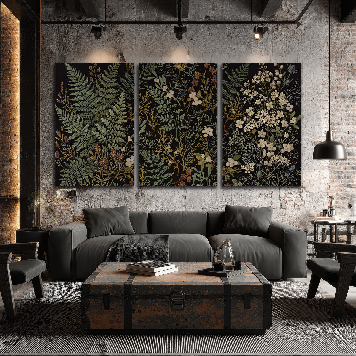 Layered green ferns and delicate cream flowers on a black background 3 piece canvas wall art displayed in a industrial room
