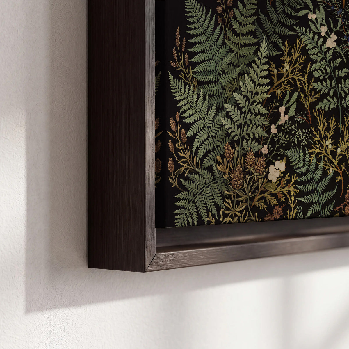 Layered green ferns and delicate cream flowers on a black background 3 piece framed canvas wall art material and edge close up