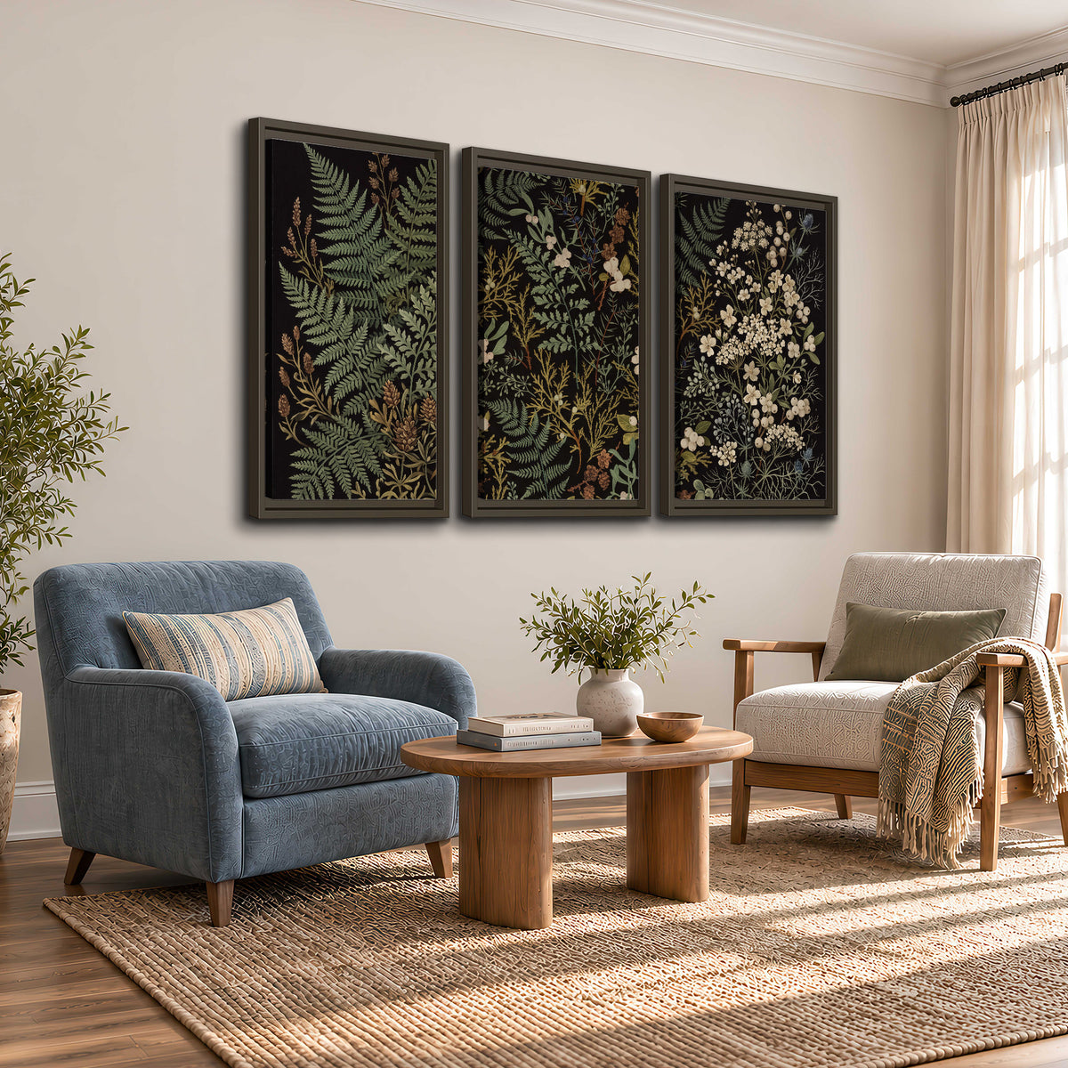 Layered green ferns and delicate cream flowers on a black background 3 piece framed canvas wall art styled in an interior