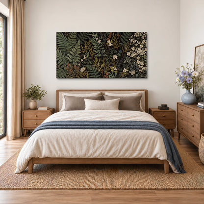 Layered green ferns and delicate cream flowers on a black background single canvas wall art styled in an interior