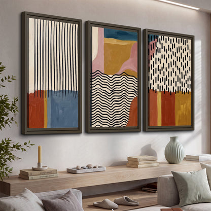 Terracotta, pink, mustard and blue shapes with black line patterns 3 piece framed canvas wall art displayed in a console