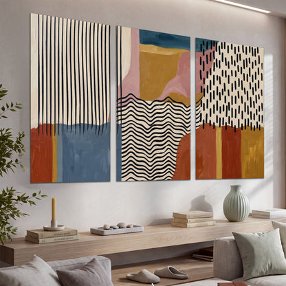 Terracotta, pink, mustard and blue shapes with black line patterns set of 3 poster prints displayed in a console