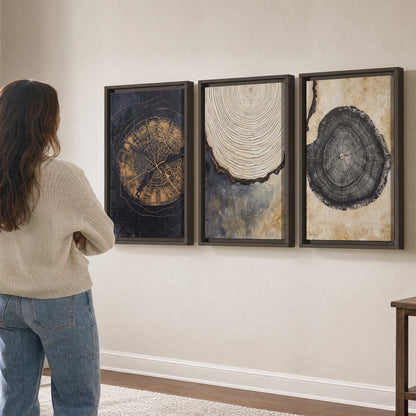 Circular tree-ring motifs in charcoal, cream and gold tones 3 piece framed canvas wall art three panel arrangement on a wall