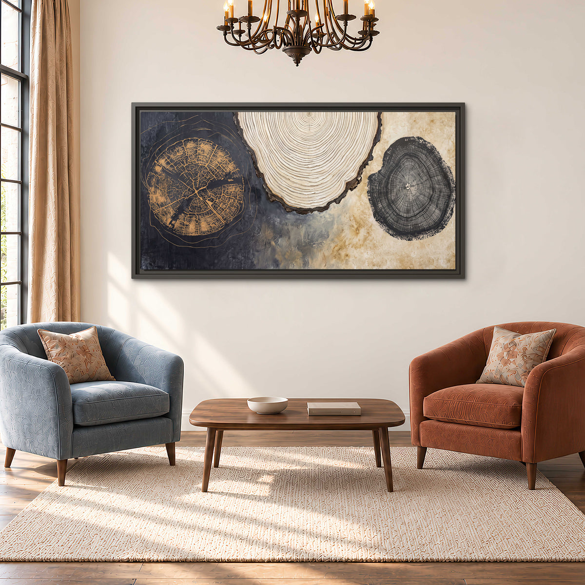 Circular tree-ring motifs in charcoal, cream and gold tones single framed canvas wall art styled in an interior