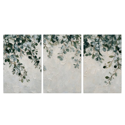 Soft green eucalyptus branches on a cream background 3 piece canvas wall art viewed straight on