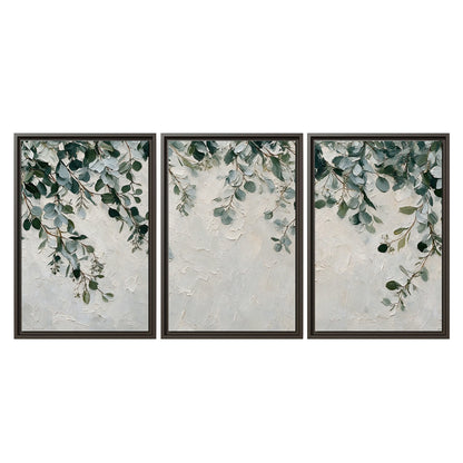 Soft green eucalyptus branches on a cream background 3 piece framed canvas wall art viewed straight on