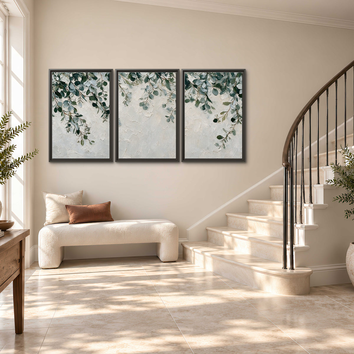 Soft green eucalyptus branches on a cream background 3 piece framed canvas wall art styled in an interior