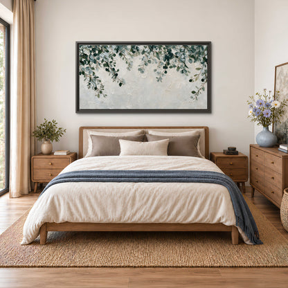 Soft green eucalyptus branches on a cream background single framed canvas wall art styled in an interior