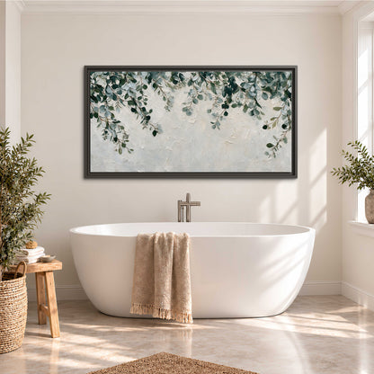 Soft green eucalyptus branches on a cream background single framed canvas wall art styled in an interior
