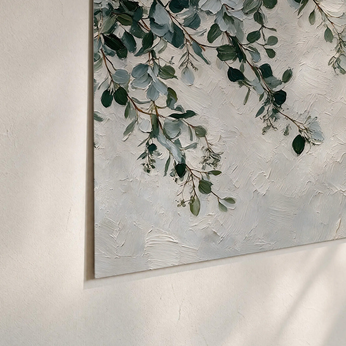 Soft green eucalyptus branches on a cream background set of 3 poster prints material and edge close up