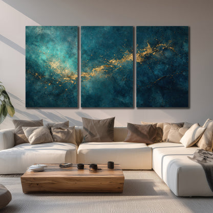 Deep teal clouds with sweeping gold-colored accents 3 piece canvas wall art displayed in a living room
