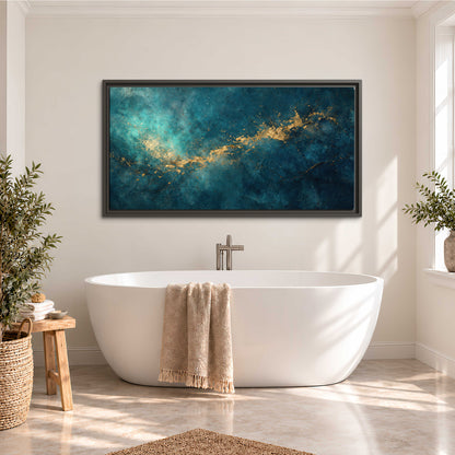 Deep teal clouds with sweeping gold-colored accents single framed canvas wall art styled in an interior