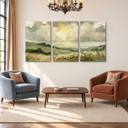 Rolling green hills beneath a luminous cloudy sky 3 piece canvas wall art styled in an interior