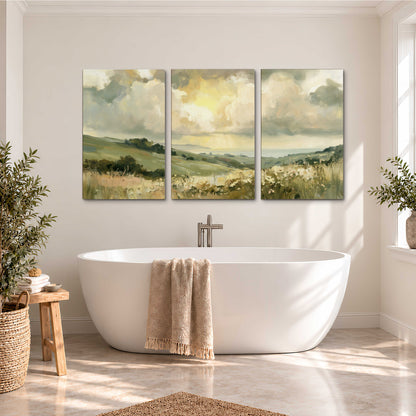 Rolling green hills beneath a luminous cloudy sky 3 piece canvas wall art styled in an interior