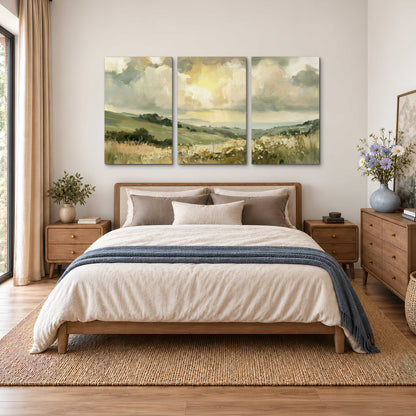 Rolling green hills beneath a luminous cloudy sky 3 piece canvas wall art styled in an interior