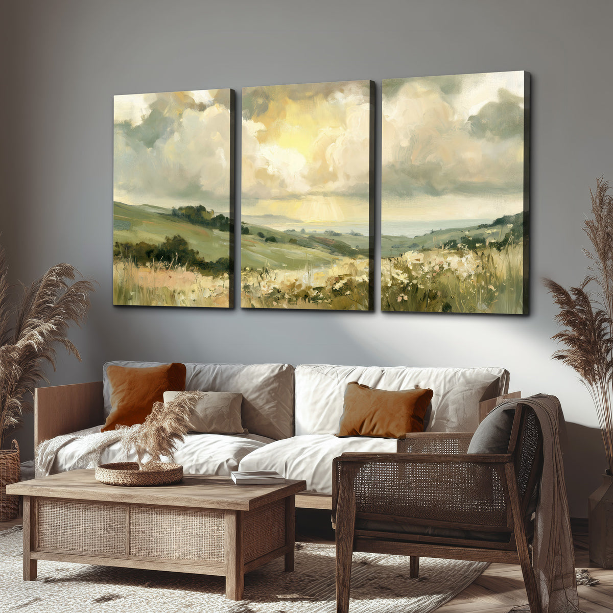 Rolling green hills beneath a luminous cloudy sky 3 piece canvas wall art displayed in a rustic living room