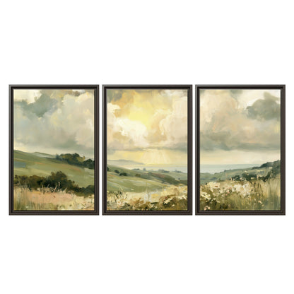 Rolling green hills beneath a luminous cloudy sky 3 piece framed canvas wall art viewed straight on