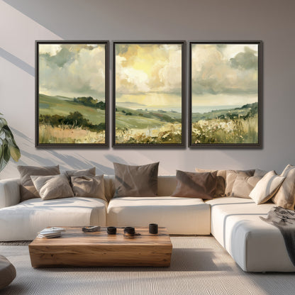 Rolling green hills beneath a luminous cloudy sky 3 piece framed canvas wall art displayed in a living room