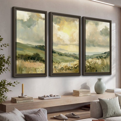Rolling green hills beneath a luminous cloudy sky 3 piece framed canvas wall art displayed in a console