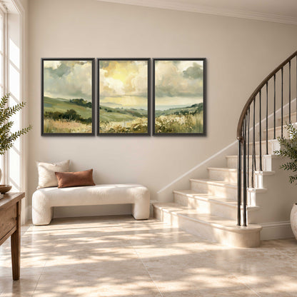 Rolling green hills beneath a luminous cloudy sky 3 piece framed canvas wall art styled in an interior