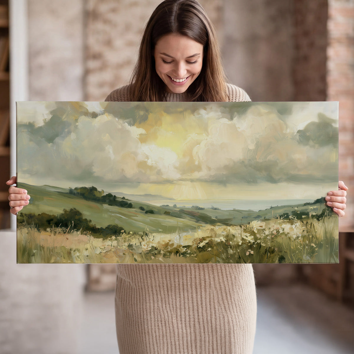 Rolling green hills beneath a luminous cloudy sky single canvas wall art held in hands