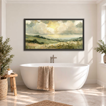 Rolling green hills beneath a luminous cloudy sky single framed canvas wall art styled in an interior