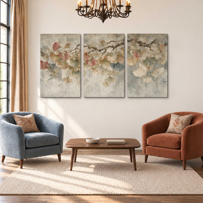 Cream and blush ginkgo leaves on delicate branches 3 piece canvas wall art styled in an interior
