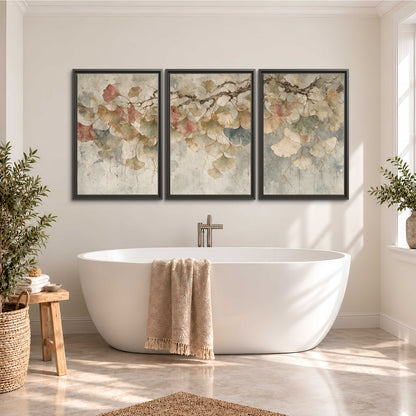 Cream and blush ginkgo leaves on delicate branches 3 piece framed canvas wall art styled in an interior