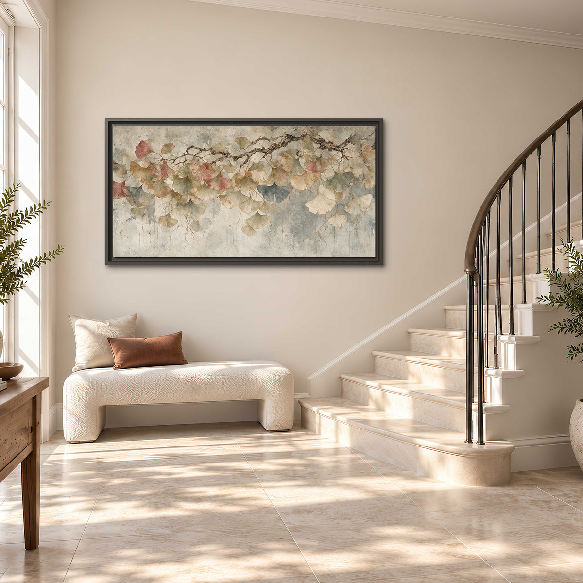 Cream and blush ginkgo leaves on delicate branches single framed canvas wall art styled in an interior