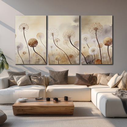 Delicate dandelion seed heads in warm misty light 3 piece canvas wall art displayed in a living room