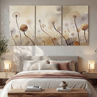 Delicate dandelion seed heads in warm misty light 3 piece canvas wall art displayed in a bedroom