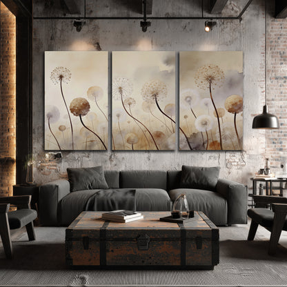 Delicate dandelion seed heads in warm misty light 3 piece canvas wall art displayed in a industrial room