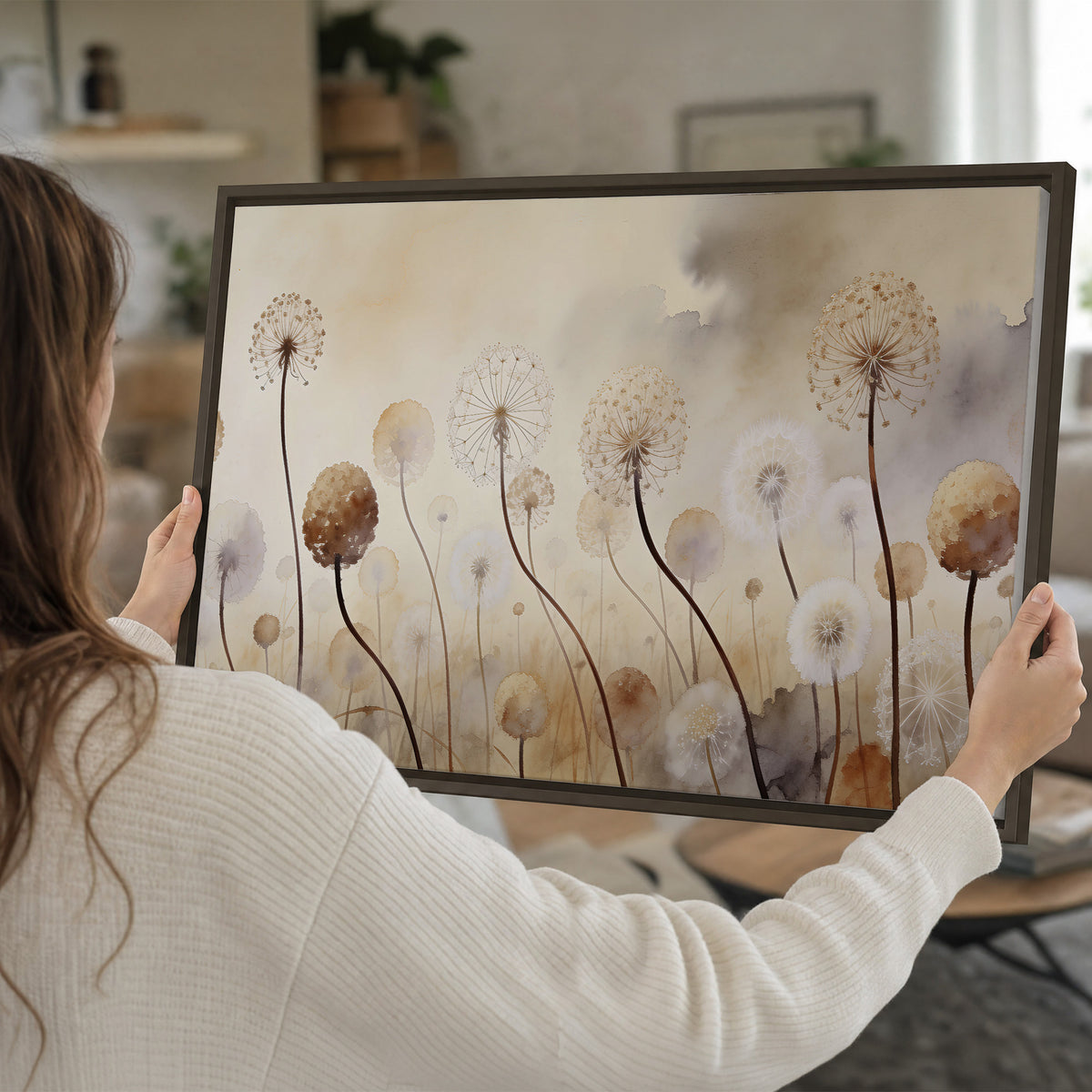 Delicate dandelion seed heads in warm misty light single framed canvas wall art held in hands