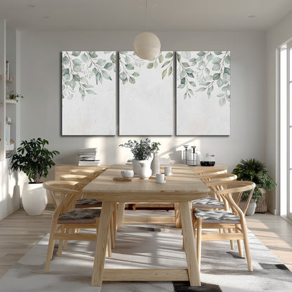 Pale sage eucalyptus leaves against a light background 3 piece canvas wall art room and product view