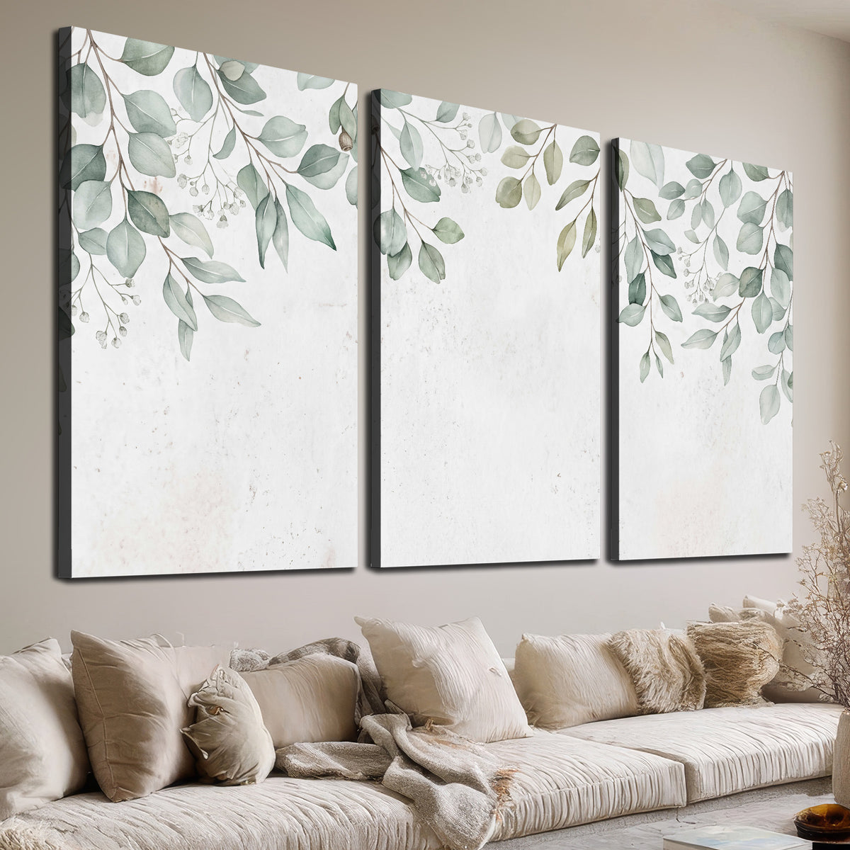 Pale sage eucalyptus leaves against a light background 3 piece canvas wall art room and product view