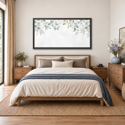 Pale sage eucalyptus leaves against a light background single framed canvas wall art styled in an interior