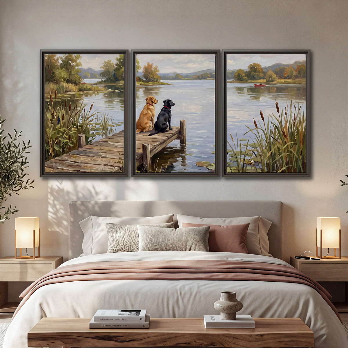 Two dogs sitting together on a wooden dock overlooking a peaceful lake 3 piece framed canvas wall art displayed in a bedroom