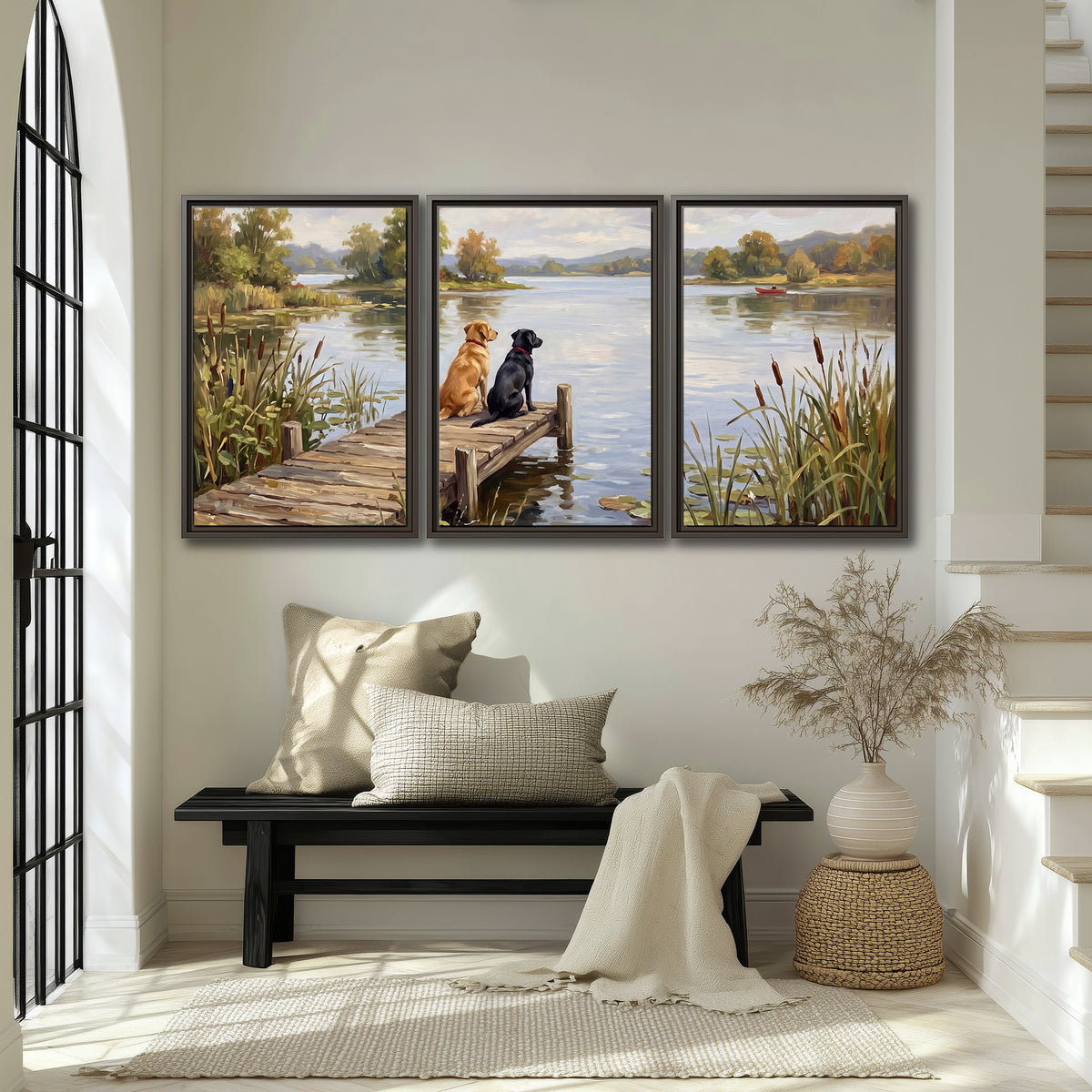 Two dogs sitting together on a wooden dock overlooking a peaceful lake 3 piece framed canvas wall art displayed in a entryway