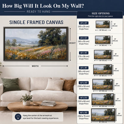 A flower-filled meadow overlooking soft blue mountain ridges single framed canvas wall art size guide above a sofa; room view is illustrative