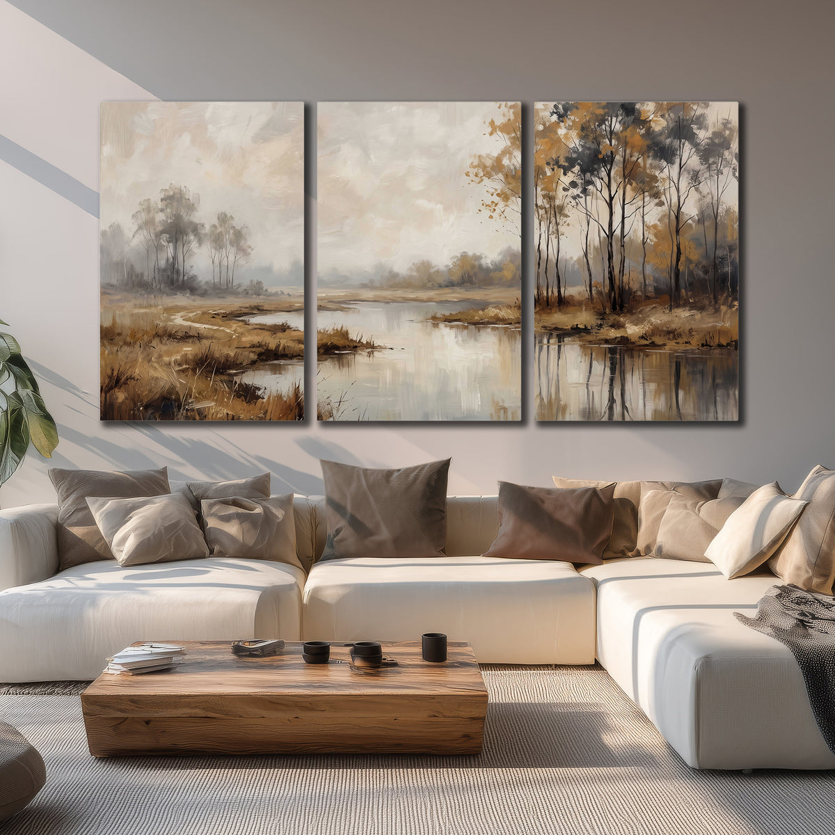 Warm autumn trees beside a quiet reflective river 3 piece canvas wall art displayed in a living room