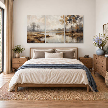 Warm autumn trees beside a quiet reflective river 3 piece canvas wall art styled in an interior