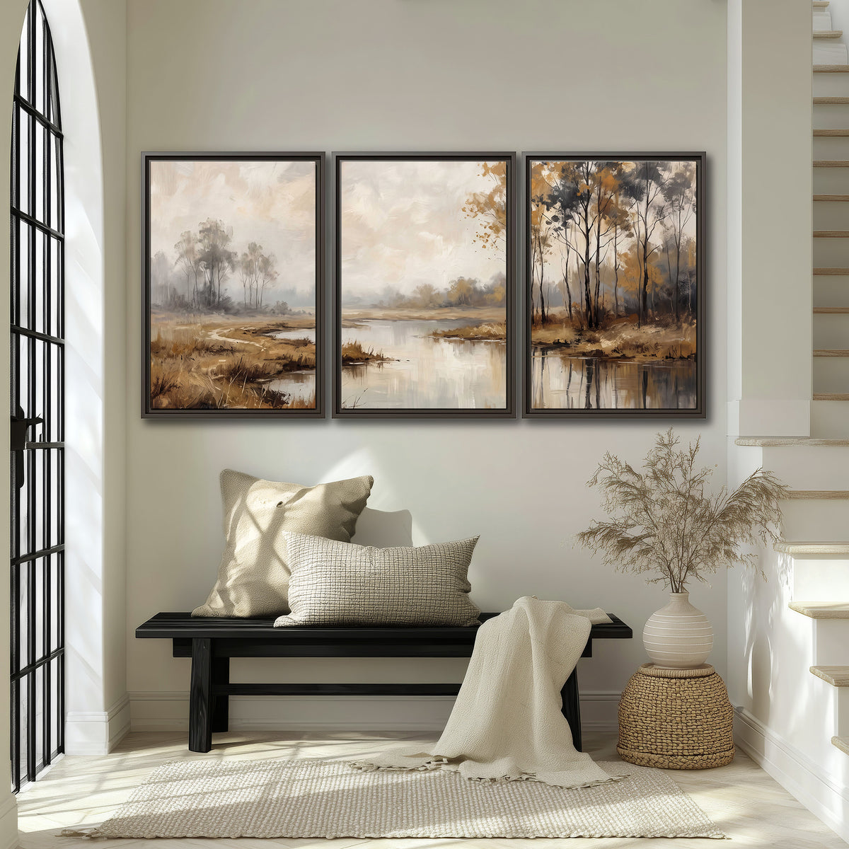 Warm autumn trees beside a quiet reflective river 3 piece framed canvas wall art displayed in a entryway