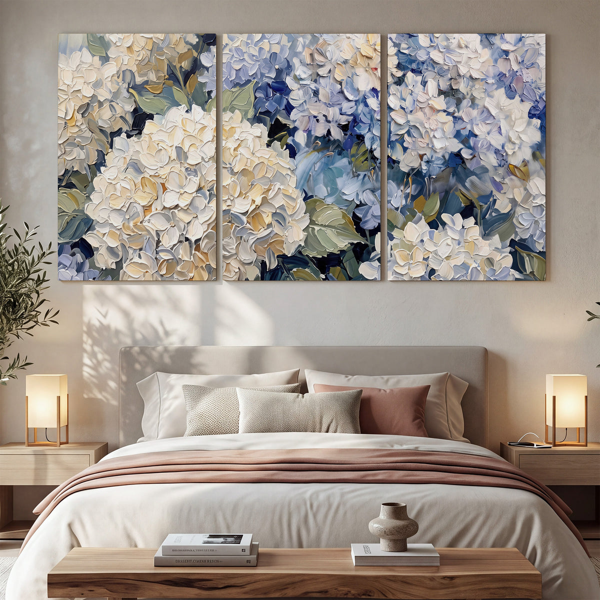 Clusters of pale blue and ivory hydrangea blossoms 3 piece canvas wall art displayed in a bedroom