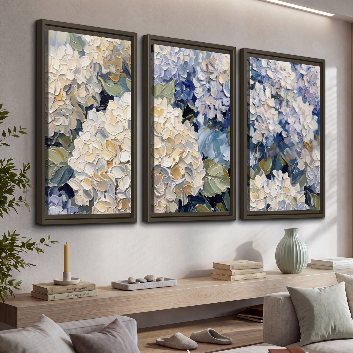 Clusters of pale blue and ivory hydrangea blossoms 3 piece framed canvas wall art displayed in a console