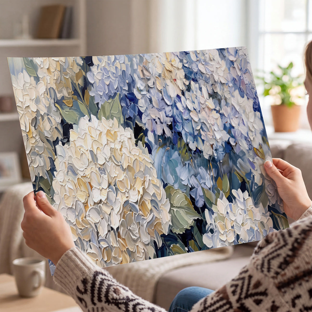Clusters of pale blue and ivory hydrangea blossoms single poster print held in hands