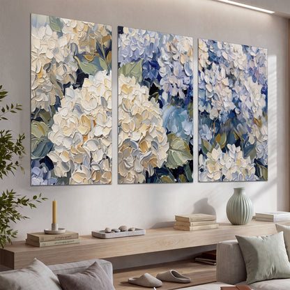 Clusters of pale blue and ivory hydrangea blossoms set of 3 poster prints displayed in a console