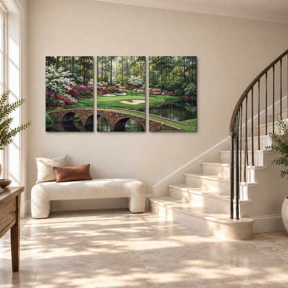 An arched stone bridge beside a landscaped golf course and reflective pond 3 piece canvas wall art styled in an interior