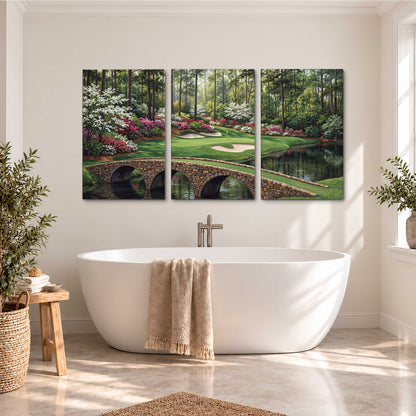 An arched stone bridge beside a landscaped golf course and reflective pond 3 piece canvas wall art styled in an interior