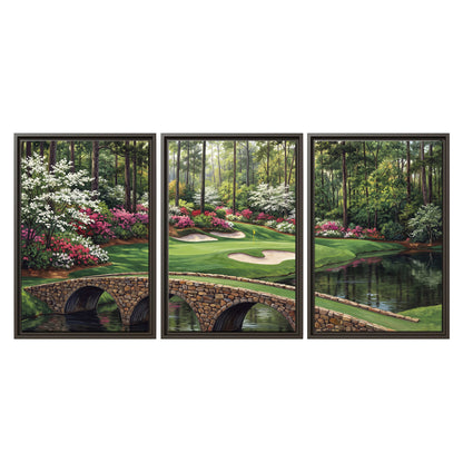 An arched stone bridge beside a landscaped golf course and reflective pond 3 piece framed canvas wall art viewed straight on